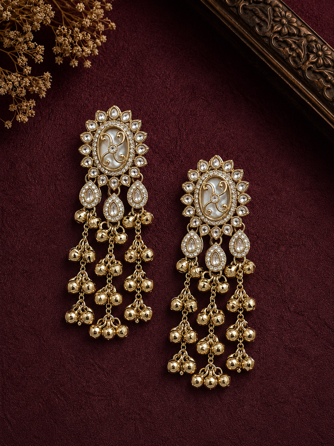 Golden Kundan Musical Charm Earrings