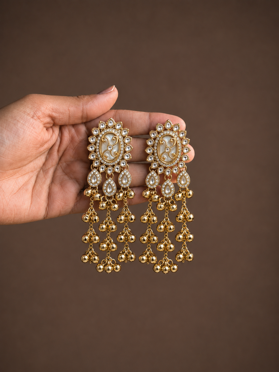 Golden Kundan Musical Charm Earrings